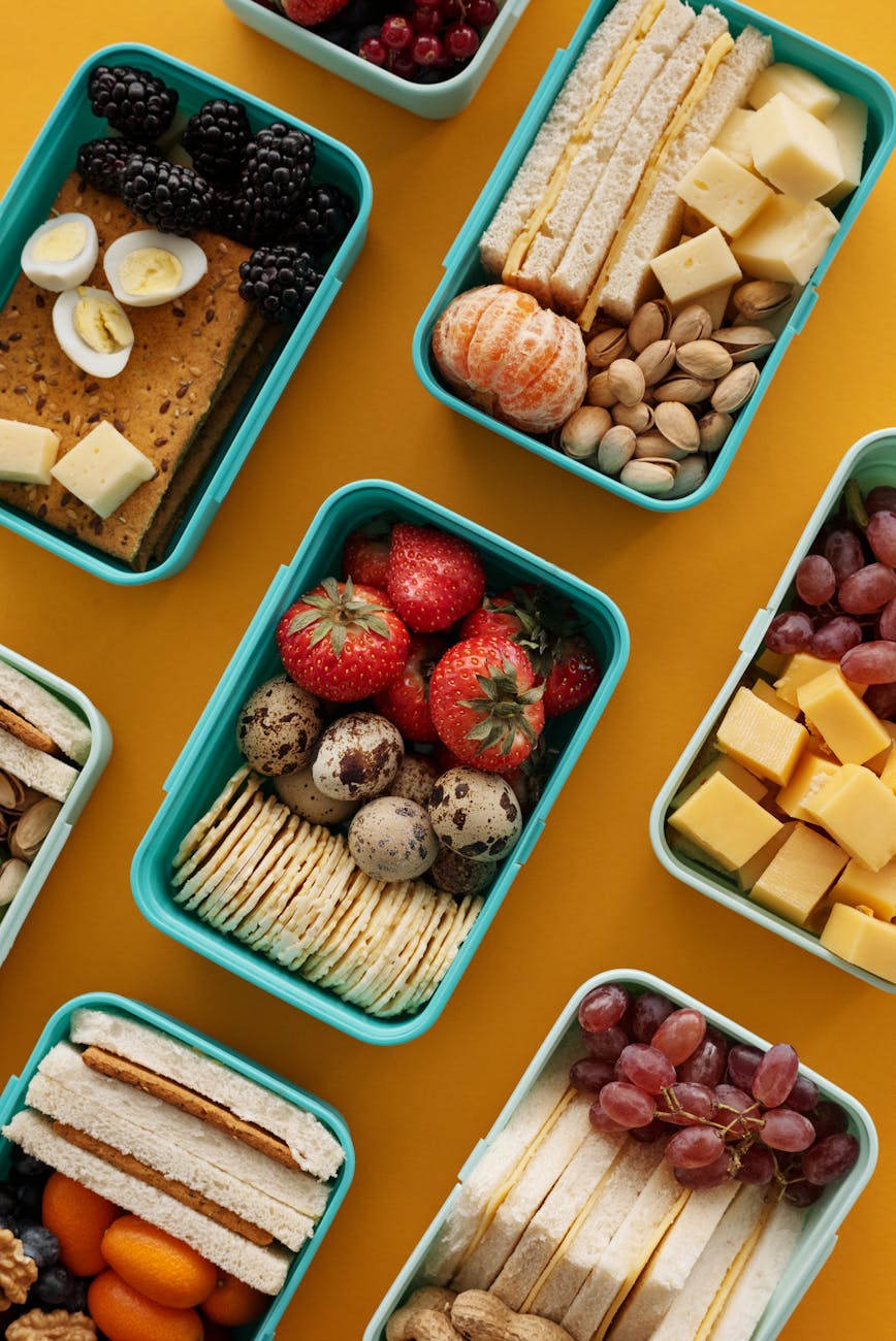strawberries and eggs on green lunch box