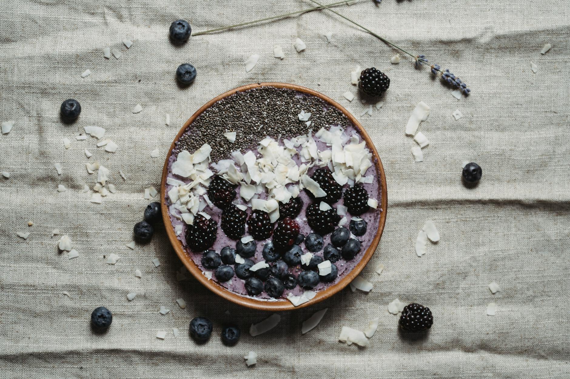 berries on brown round bowl